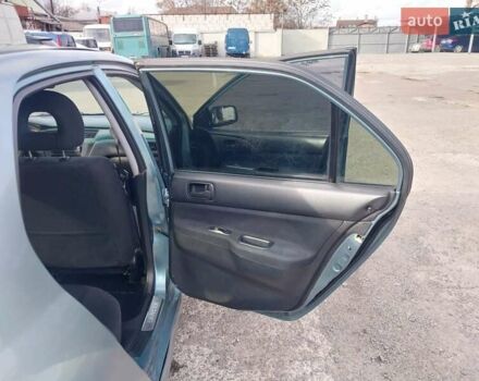 Зелений Міцубісі Lancer, об'ємом двигуна 1.58 л та пробігом 272 тис. км за 3800 $, фото 20 на Automoto.ua