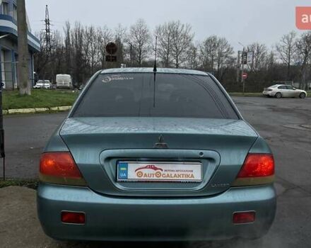 Зелений Міцубісі Lancer, об'ємом двигуна 1.6 л та пробігом 262 тис. км за 3999 $, фото 5 на Automoto.ua