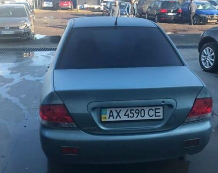 Зеленый Мицубиси Лансер, объемом двигателя 1.6 л и пробегом 184 тыс. км за 2000 $, фото 6 на Automoto.ua