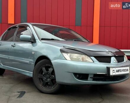 Зелений Міцубісі Lancer, об'ємом двигуна 1.58 л та пробігом 208 тис. км за 3990 $, фото 1 на Automoto.ua