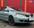 Зелений Міцубісі Lancer, об'ємом двигуна 1.58 л та пробігом 208 тис. км за 3990 $, фото 1 на Automoto.ua