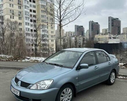 Зеленый Мицубиси Лансер, объемом двигателя 1.58 л и пробегом 207 тыс. км за 4200 $, фото 5 на Automoto.ua