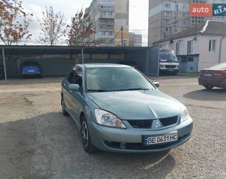 Зелений Міцубісі Lancer, об'ємом двигуна 1.58 л та пробігом 272 тис. км за 3800 $, фото 13 на Automoto.ua