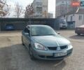 Зелений Міцубісі Lancer, об'ємом двигуна 1.58 л та пробігом 272 тис. км за 3800 $, фото 13 на Automoto.ua
