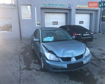 Зеленый Мицубиси Лансер, объемом двигателя 1.6 л и пробегом 184 тыс. км за 2000 $, фото 5 на Automoto.ua