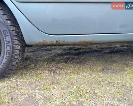 Зеленый Мицубиси Лансер, объемом двигателя 1.58 л и пробегом 224 тыс. км за 3500 $, фото 5 на Automoto.ua