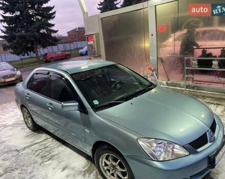 Зеленый Мицубиси Лансер, объемом двигателя 1.58 л и пробегом 352 тыс. км за 3700 $, фото 3 на Automoto.ua