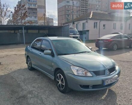 Зелений Міцубісі Lancer, об'ємом двигуна 1.58 л та пробігом 272 тис. км за 3800 $, фото 12 на Automoto.ua