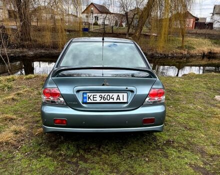 Зелений Міцубісі Lancer, об'ємом двигуна 2 л та пробігом 225 тис. км за 5600 $, фото 5 на Automoto.ua