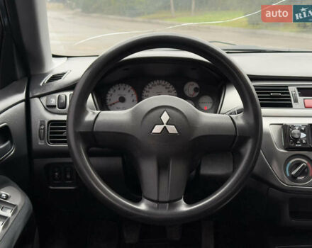 Зеленый Мицубиси Лансер, объемом двигателя 1.6 л и пробегом 214 тыс. км за 4150 $, фото 14 на Automoto.ua