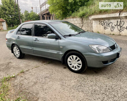 Зелений Міцубісі Lancer, об'ємом двигуна 1.6 л та пробігом 220 тис. км за 4750 $, фото 9 на Automoto.ua