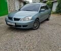 Зелений Міцубісі Lancer, об'ємом двигуна 1.58 л та пробігом 227 тис. км за 4200 $, фото 1 на Automoto.ua
