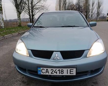 Зелений Міцубісі Lancer, об'ємом двигуна 1.6 л та пробігом 162 тис. км за 4700 $, фото 4 на Automoto.ua