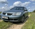 Зеленый Мицубиси Лансер, объемом двигателя 1.6 л и пробегом 309 тыс. км за 3800 $, фото 1 на Automoto.ua