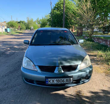 Зелений Міцубісі Lancer, об'ємом двигуна 1.6 л та пробігом 220 тис. км за 3700 $, фото 1 на Automoto.ua
