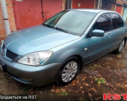Зелений Міцубісі Lancer, об'ємом двигуна 1.6 л та пробігом 219 тис. км за 4900 $, фото 12 на Automoto.ua