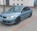 Зеленый Мицубиси Лансер, объемом двигателя 1.6 л и пробегом 249 тыс. км за 4100 $, фото 1 на Automoto.ua