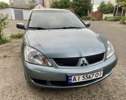 Зелений Міцубісі Lancer, об'ємом двигуна 1.6 л та пробігом 200 тис. км за 4750 $, фото 11 на Automoto.ua