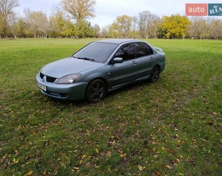 Міцубісі Lancer 2007 у Беляевке на Automoto.ua Зелений Міцубісі Lancer, об'ємом двигуна 2 л та пробігом 238 тис. км за 3400 $, фото 4 на Automoto.ua