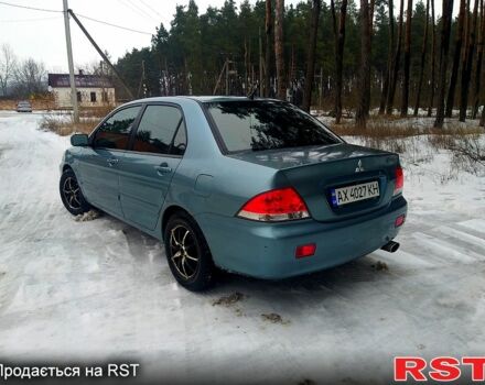 Зелений Міцубісі Lancer, об'ємом двигуна 1.6 л та пробігом 219 тис. км за 4800 $, фото 12 на Automoto.ua