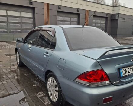 Зеленый Мицубиси Лансер, объемом двигателя 1.6 л и пробегом 165 тыс. км за 5500 $, фото 1 на Automoto.ua