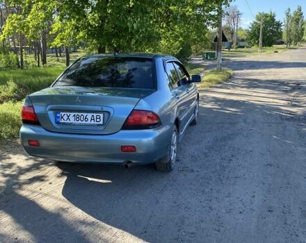Зелений Міцубісі Lancer, об'ємом двигуна 1.6 л та пробігом 220 тис. км за 3700 $, фото 3 на Automoto.ua