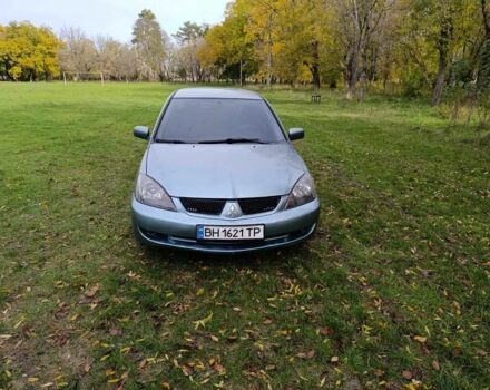 Зелений Міцубісі Lancer, об'ємом двигуна 2 л та пробігом 238 тис. км за 3400 $, фото 1 на Automoto.ua