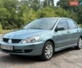 Зелений Міцубісі Lancer, об'ємом двигуна 1.58 л та пробігом 326 тис. км за 3999 $, фото 1 на Automoto.ua