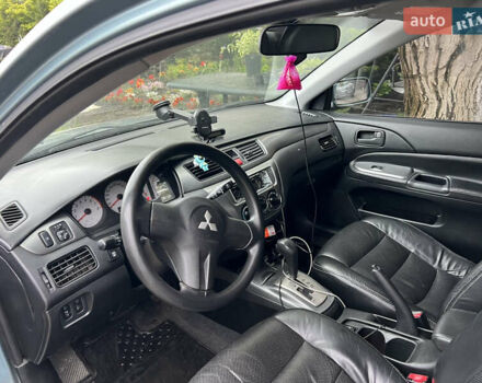 Зелений Міцубісі Lancer, об'ємом двигуна 1.6 л та пробігом 217 тис. км за 5400 $, фото 6 на Automoto.ua