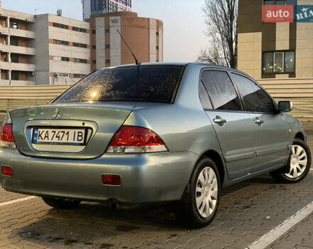 Зелений Міцубісі Lancer, об'ємом двигуна 1.58 л та пробігом 276 тис. км за 3400 $, фото 2 на Automoto.ua