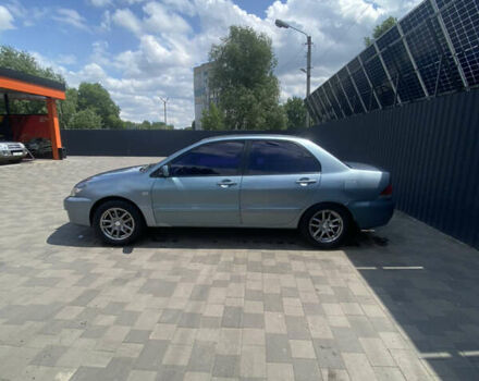 Зелений Міцубісі Lancer, об'ємом двигуна 1.58 л та пробігом 220 тис. км за 4500 $, фото 7 на Automoto.ua