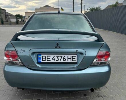 Зеленый Мицубиси Лансер, объемом двигателя 1.6 л и пробегом 300 тыс. км за 3800 $, фото 6 на Automoto.ua