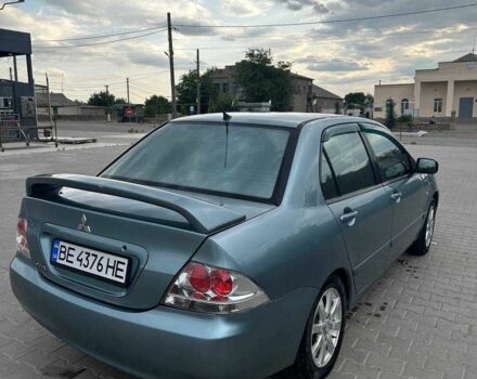 Зеленый Мицубиси Лансер, объемом двигателя 1.6 л и пробегом 300 тыс. км за 3800 $, фото 7 на Automoto.ua