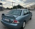 Зеленый Мицубиси Лансер, объемом двигателя 1.6 л и пробегом 300 тыс. км за 3800 $, фото 7 на Automoto.ua