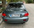 Зеленый Мицубиси Лансер, объемом двигателя 1.6 л и пробегом 255 тыс. км за 4000 $, фото 1 на Automoto.ua