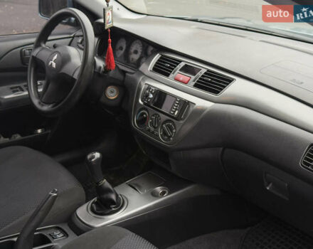 Зеленый Мицубиси Лансер, объемом двигателя 1.6 л и пробегом 214 тыс. км за 4150 $, фото 15 на Automoto.ua