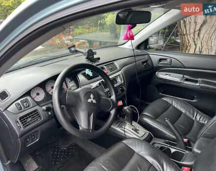 Зелений Міцубісі Lancer, об'ємом двигуна 1.6 л та пробігом 217 тис. км за 5400 $, фото 5 на Automoto.ua