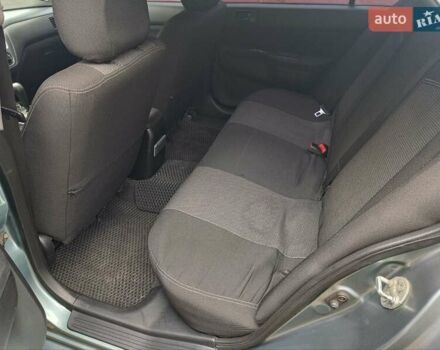 Зеленый Мицубиси Лансер, объемом двигателя 1.6 л и пробегом 219 тыс. км за 5300 $, фото 19 на Automoto.ua