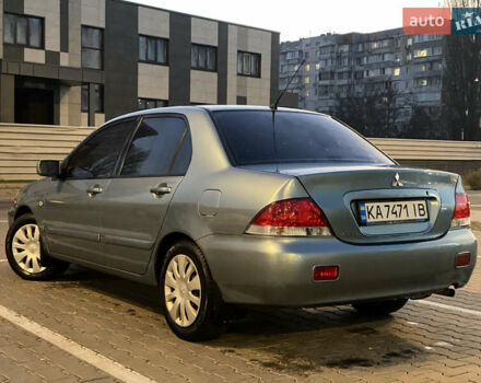 Зелений Міцубісі Lancer, об'ємом двигуна 1.58 л та пробігом 276 тис. км за 3400 $, фото 1 на Automoto.ua
