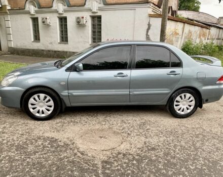 Зелений Міцубісі Lancer, об'ємом двигуна 1.6 л та пробігом 200 тис. км за 4750 $, фото 3 на Automoto.ua