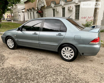 Зелений Міцубісі Lancer, об'ємом двигуна 1.6 л та пробігом 220 тис. км за 4750 $, фото 4 на Automoto.ua