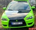 Зелений Міцубісі Lancer, об'ємом двигуна 2 л та пробігом 227 тис. км за 7200 $, фото 1 на Automoto.ua