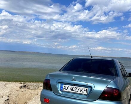 Зеленый Мицубиси Лансер, объемом двигателя 1.6 л и пробегом 238 тыс. км за 4000 $, фото 3 на Automoto.ua