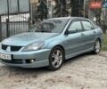 Зелений Міцубісі Lancer, об'ємом двигуна 2 л та пробігом 249 тис. км за 4500 $, фото 1 на Automoto.ua