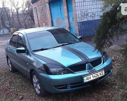 Зелений Міцубісі Lancer, об'ємом двигуна 1.6 л та пробігом 173 тис. км за 6300 $, фото 9 на Automoto.ua