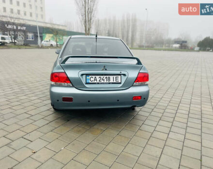 Зеленый Мицубиси Лансер, объемом двигателя 1.6 л и пробегом 164 тыс. км за 5000 $, фото 2 на Automoto.ua