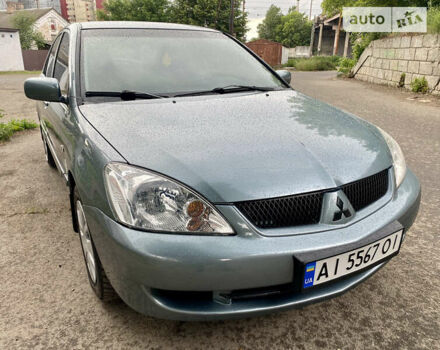 Зелений Міцубісі Lancer, об'ємом двигуна 1.6 л та пробігом 220 тис. км за 4750 $, фото 11 на Automoto.ua