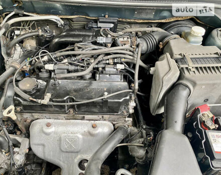 Зелений Міцубісі Lancer, об'ємом двигуна 1.6 л та пробігом 220 тис. км за 4750 $, фото 44 на Automoto.ua