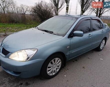 Зелений Міцубісі Lancer, об'ємом двигуна 1.6 л та пробігом 162 тис. км за 4700 $, фото 7 на Automoto.ua