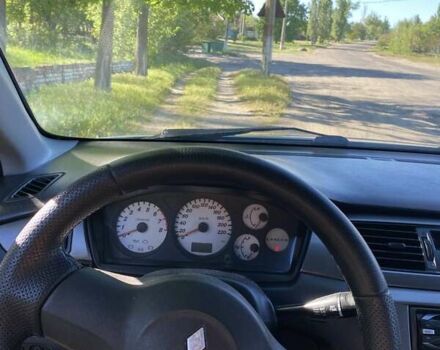 Зелений Міцубісі Lancer, об'ємом двигуна 1.6 л та пробігом 220 тис. км за 3700 $, фото 5 на Automoto.ua